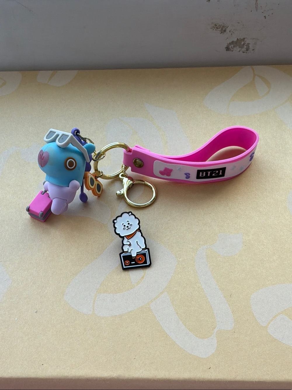 Pink Character Wrist Keychain with Blue Figure Charm